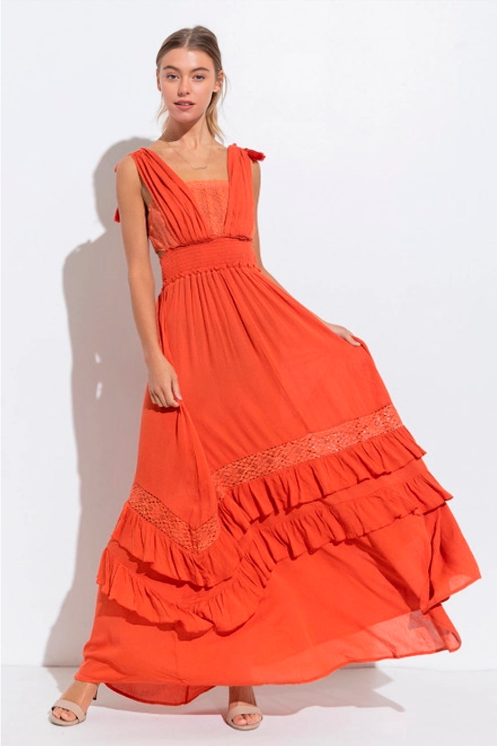 Crinkle Rayon Maxi Dress: Versatile and stylish maxi dress with smocked waist, inner tube top detail, and tassel ties. Crinkle rayon fabric offers a relaxed drape, making it perfect for various occasions. Lined for comfort and coverage. A trendy addition to your wardrobe.