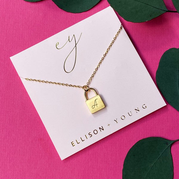 Ellison and Young Scripted Notes Locket Initial Necklace