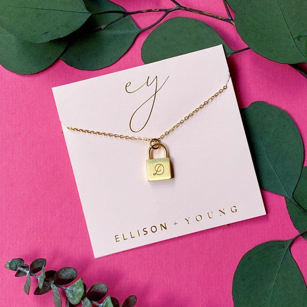 Ellison and Young Scripted Notes Locket Initial Necklace