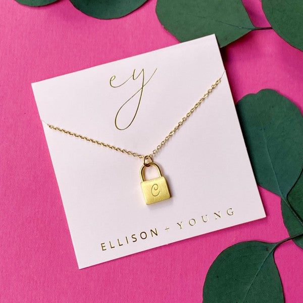 Ellison and Young Scripted Notes Locket Initial Necklace