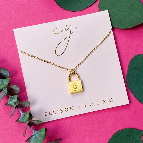 Ellison and Young Scripted Notes Locket Initial Necklace