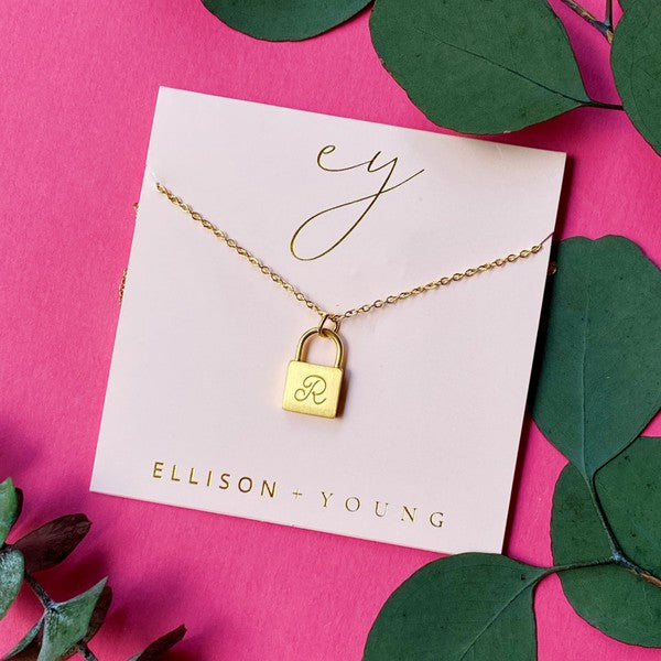 Ellison and Young Scripted Notes Locket Initial Necklace