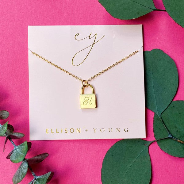 Ellison and Young Scripted Notes Locket Initial Necklace