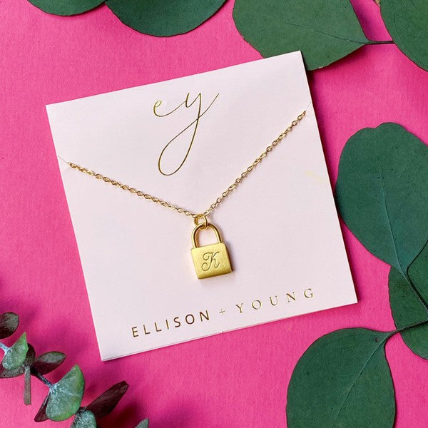 Ellison and Young Scripted Notes Locket Initial Necklace