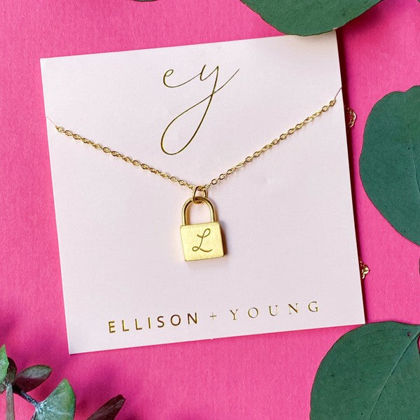 Ellison and Young Scripted Notes Locket Initial Necklace