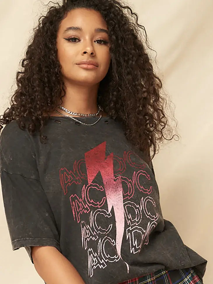 Mineral washed vintage-style t-shirt featuring iconic AC/DC logo, available at Boho Soho - a trendy and eclectic fashion destination for unique and retro-inspired apparel.