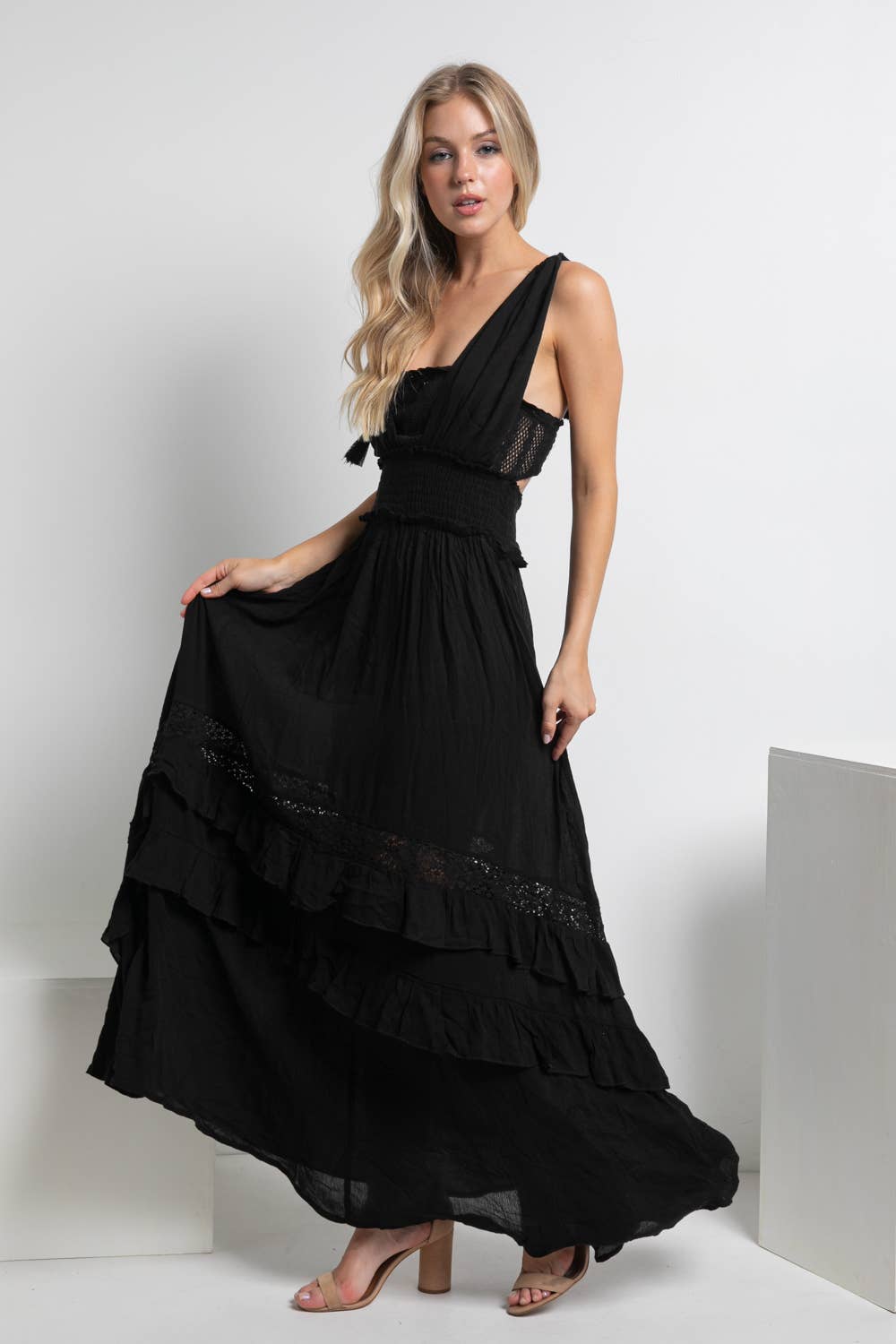 Crinkle Rayon Maxi Dress: Versatile and stylish maxi dress with smocked waist, inner tube top detail, and tassel ties. Crinkle rayon fabric offers a relaxed drape, making it perfect for various occasions. Lined for comfort and coverage. A trendy addition to your wardrobe.