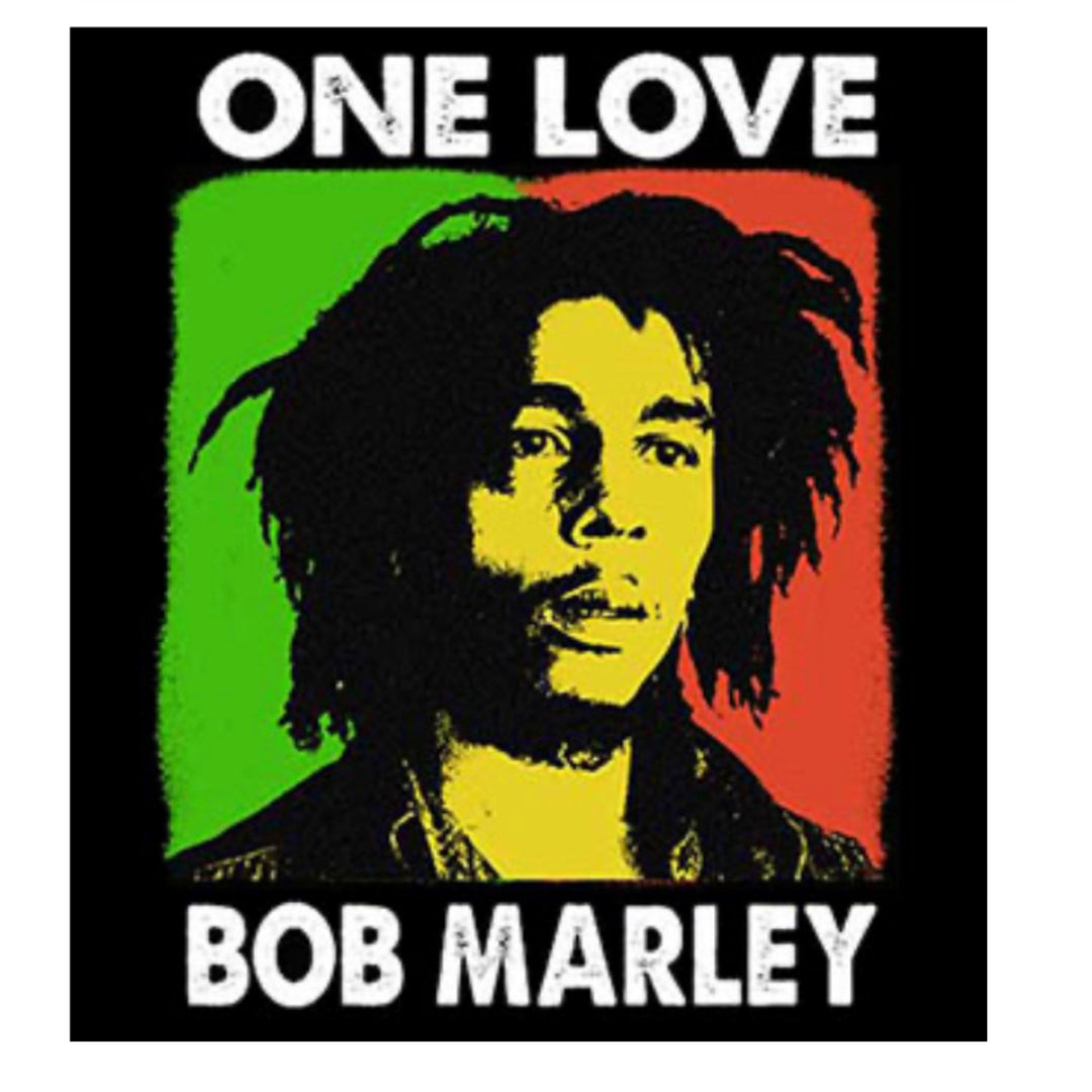 Bob Marley 'One Love' Graphic Tee: Showcase your love for music and style with this short sleeve tee. Embrace iconic reggae vibes in comfort with a unique design inspired by the legendary Bob Marley. Shop now to add a touch of musical heritage to your wardrobe with this must-have graphic tee
